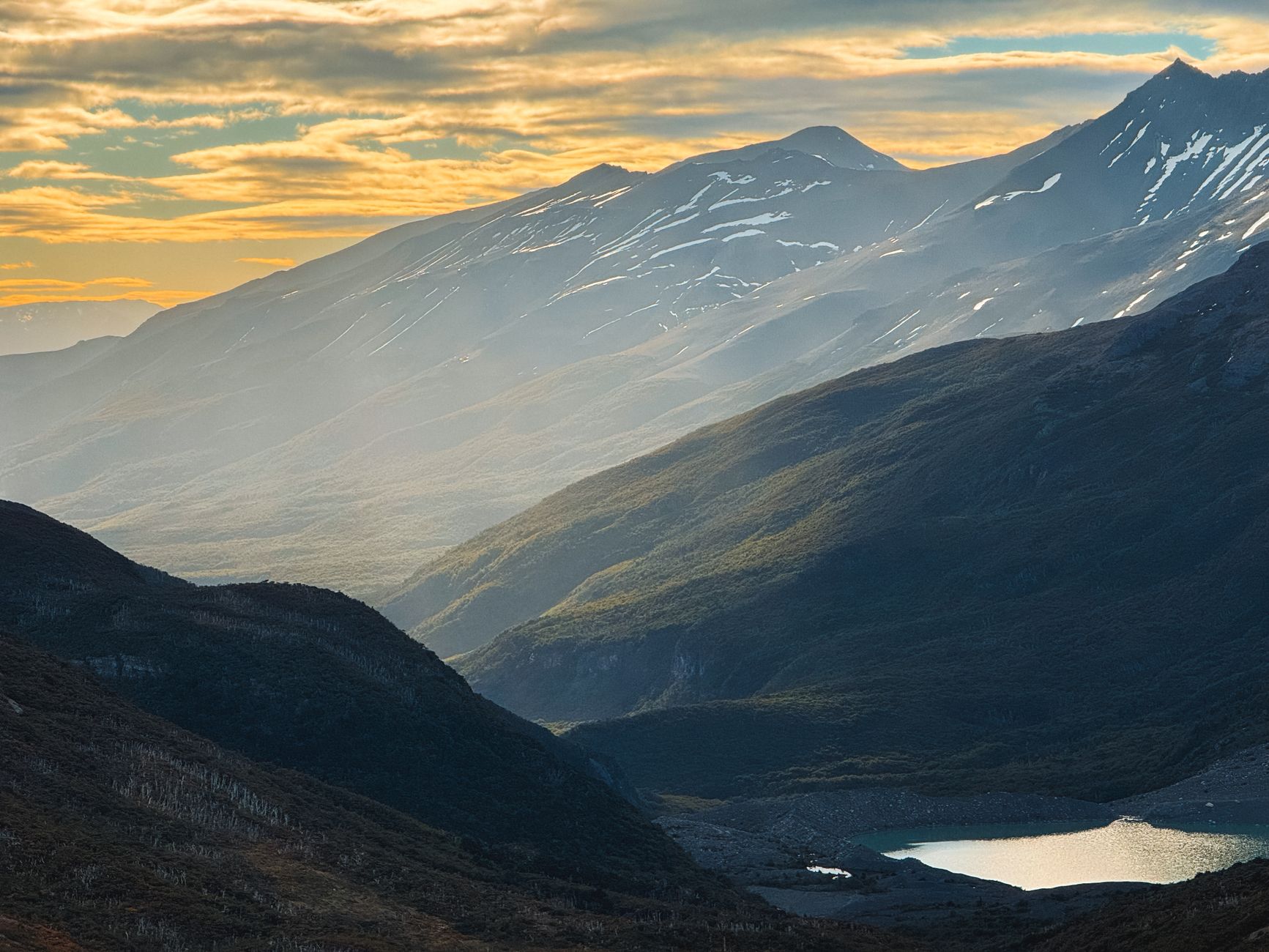 Patagonian mountain ridge against vast skies